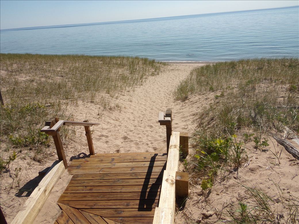 beach wooden boardwalk and stairs to beach access