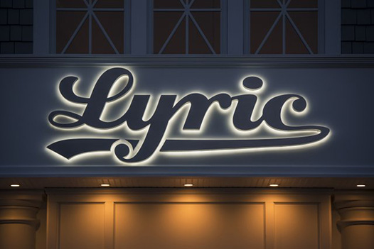 backlit building sign reading 'Lyric'