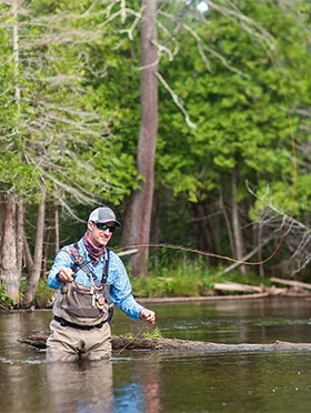 Flyfishing CTA A man flyfishing